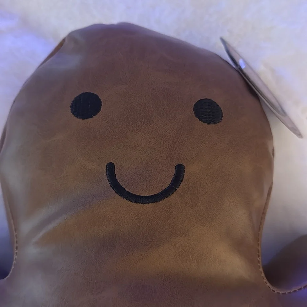 Aspen Christmas gingerbread man faux leather pillow